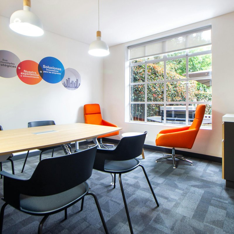 Acoustic-friendly commercial flooring with carpet tiles and vinyl planks designed for noise reduction in modern workplaces and retail spaces.
